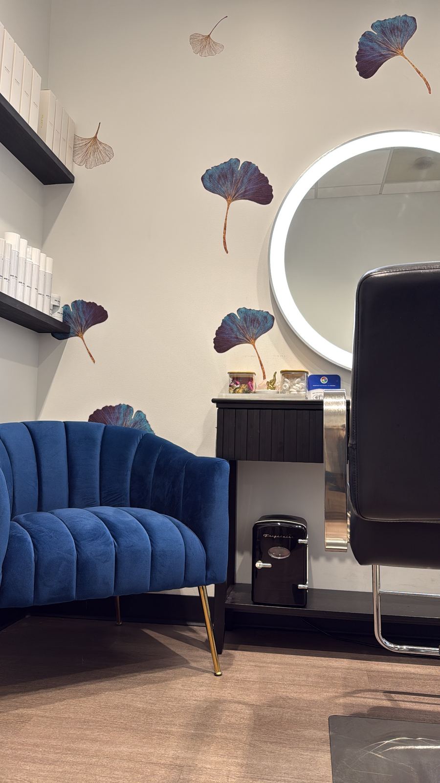 Ginkgo leaf wall art and styling station at Hue Boutique Salon in Alameda, CA