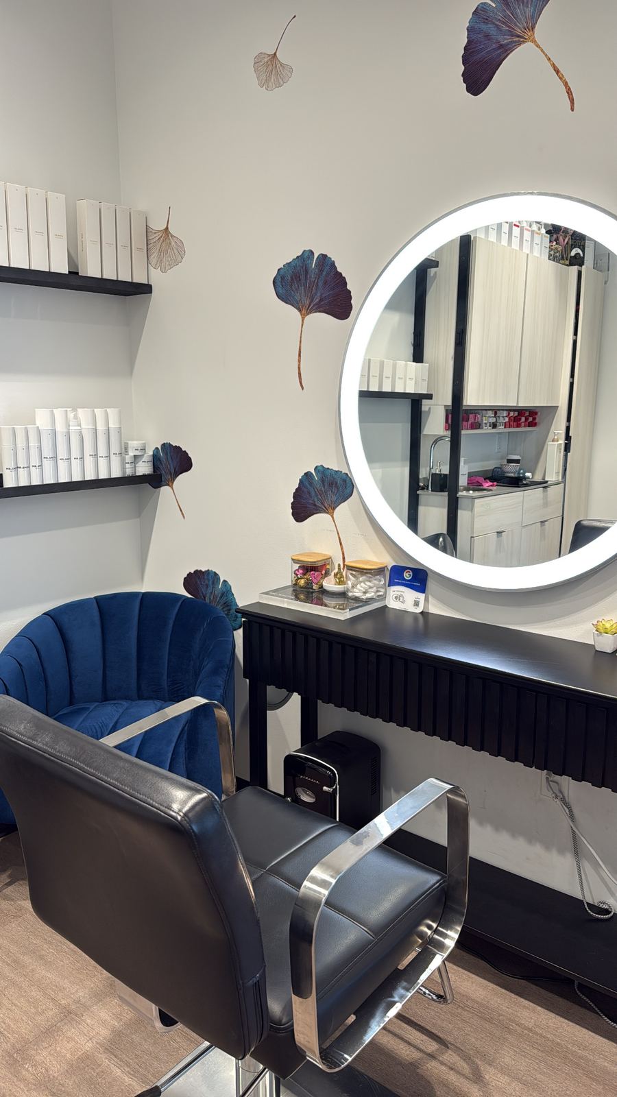 Hue Boutique Salon color station in Alameda, CA, with navy velvet chair and lit mirror